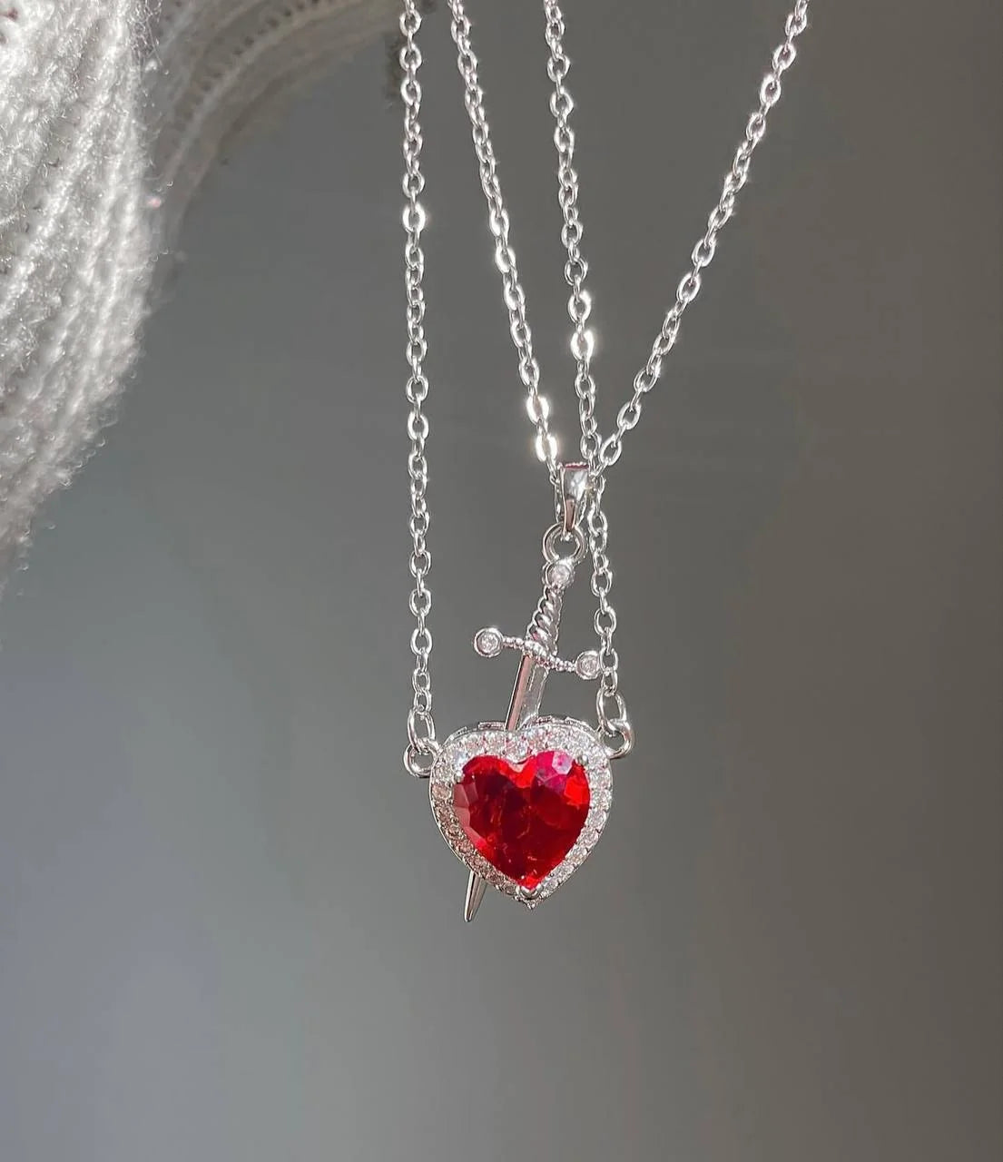 Set de collares de pareja corazon y espada